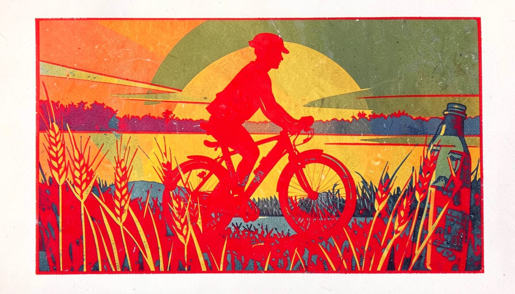 A linocut relief print of a cyclist silhouetted against a sunrise, with wheat stalks and a water bottle in the foreground, using warm amber, olive, and slate blue.