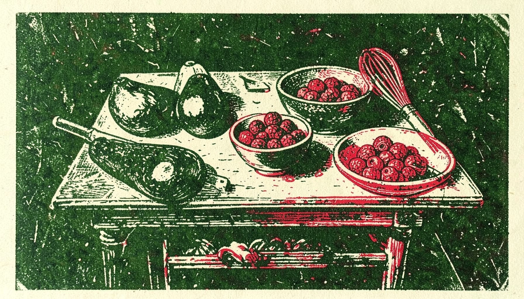 A linocut relief print of a rustic kitchen table with fresh avocados, a bowl of berries, and a whisk, rendered in deep green, cream, and charcoal tones against a textured background.