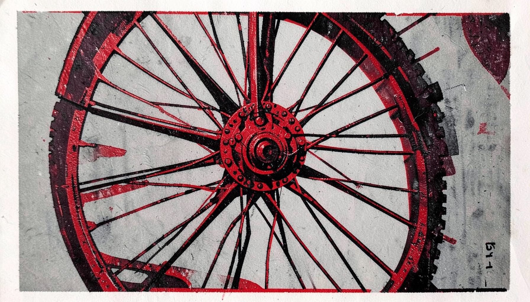 A linocut print of a bicycle wheel detail — spokes and hub in crisp black lines against a muted grey backdrop